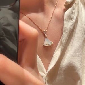 Elegant Gold and Silver Pendant Necklace